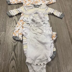 Gray and White Bodysuit with Snap Closures and Long Sleeves